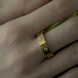 Ring aus Edelstahl mit Glanzsteinen, vergoldet