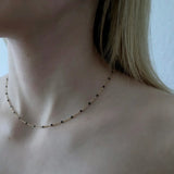 Halskette mit schwarze Emaille, vergoldet